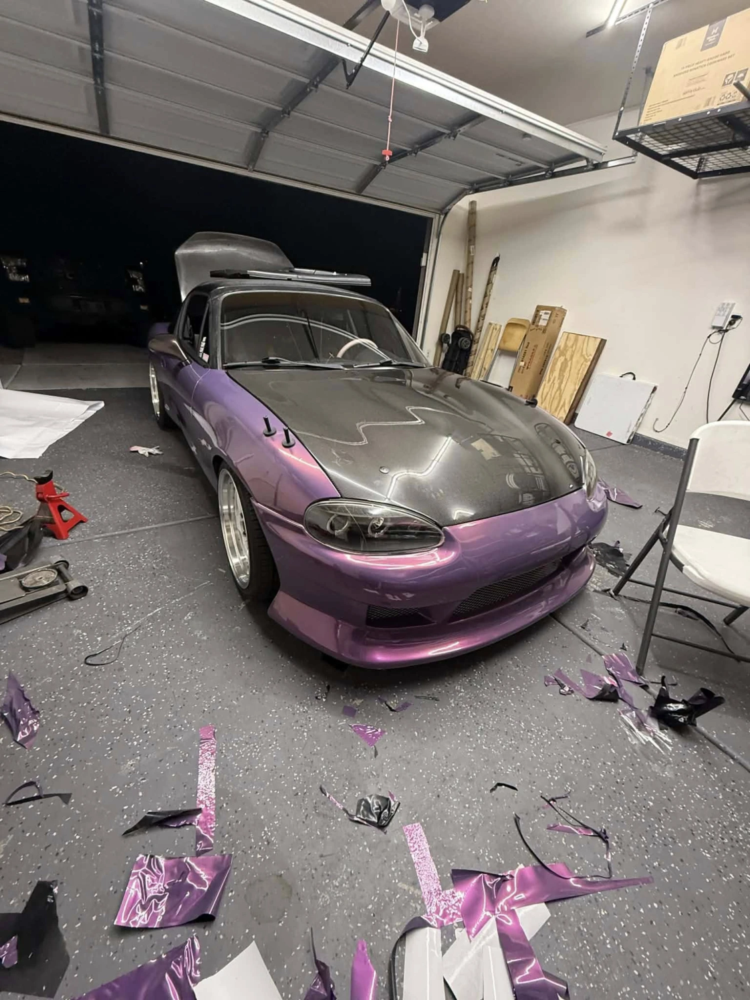 Custom-wrapped Mazda Miata in the shop